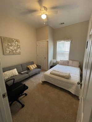 Bedroom 2 - full bed and couch. Collapsible work desk and linens included. 