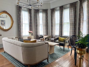 The parlor with designer furnishings, fixtures, & finishes! Several spots for conversation, study, and sipping a favorite beverage. The lighting in this space is refreshing.