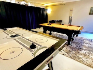 Your private rec room with BILLIARDS, AIR HOCKEY, FOOSBALL, DARTS and 3 ARCADES