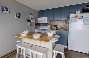 The table for four is a great place to gather for meals!