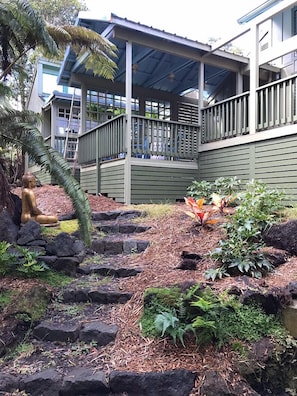 The large buddah sits in the back garden viewable from the lanai.