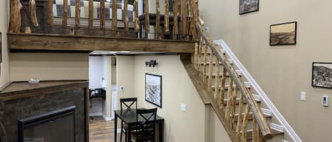 Inviting staircase to the second floor loft.