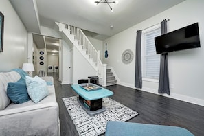 Living Room with board games and small digital piano