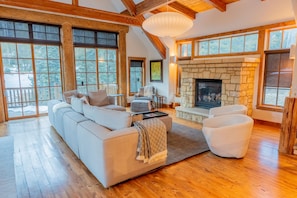 Living room, gas fireplace, abundant windows