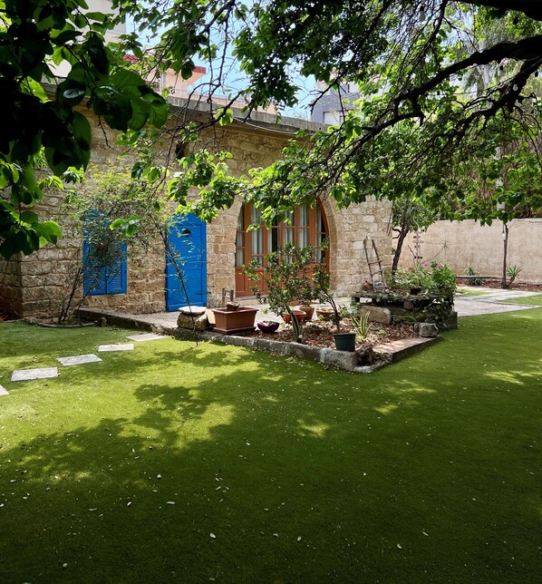 Authentic greenery exterior of Beit Tout