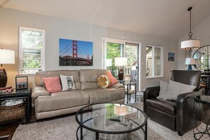 living room with reclining sofa and reclining chair for relaxing tv watching
