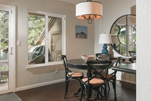 table for four + two counter height bar stools