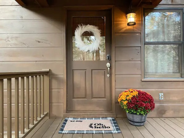 Open the door to your peaceful vacation home at Creekhaven cabin.