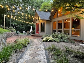 Back patio for relaxing with a glass of wine; has table w/ chairs, grill, fire pit and small water fountain that burbles peacefully