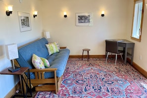 Living room with futon and work desk