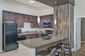 Full kitchen with everything seen here. Washer &amp; dryer in each unit.
