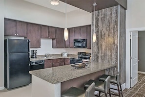 Full kitchen with everything seen here. Washer & dryer in each unit.
