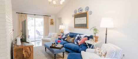 TV room with doors to the deck. Smart TV and Apple TV. 