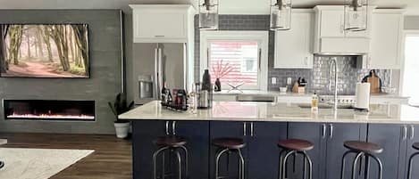 Amazing Chef's Kitchen with panoramic lake views.
