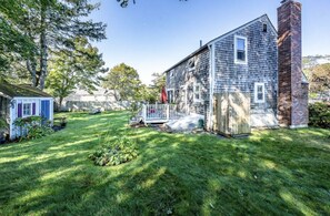 Fenced in yard w/ outdoor shower