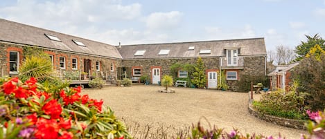 View from garden to Barn and Cottage courtyard.