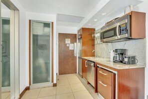 Fully-equipped kitchen kitchen complete with appliances and cookware