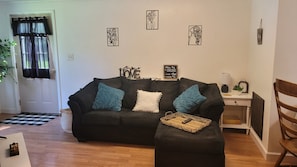 Come, sit, and relax. Super comfy L couch and a smart TV with internet. 