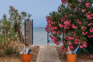 garden gate opening onto the beach