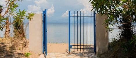 garden gate opens directly onto the beach