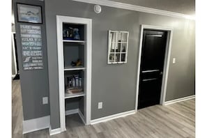 Pantry area to store your snacks! Door leads to accessible primary bathroom.
