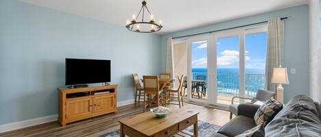 Living Area with Ocean Views, Flat Screen TV, Sleeper Sofa and Private Balcony Access