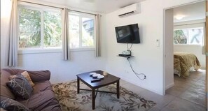 Relax and be entertained in the living area with flat screen TV. The property also has an air condition unit