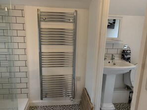 Bright shower room with separate loo area