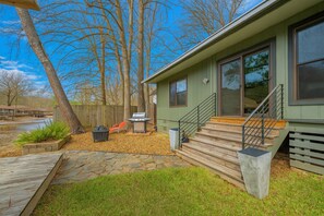 Back Exterior of The Pedal Pad | Steps go into Sun Room | Fire Pit and BBQ Grill