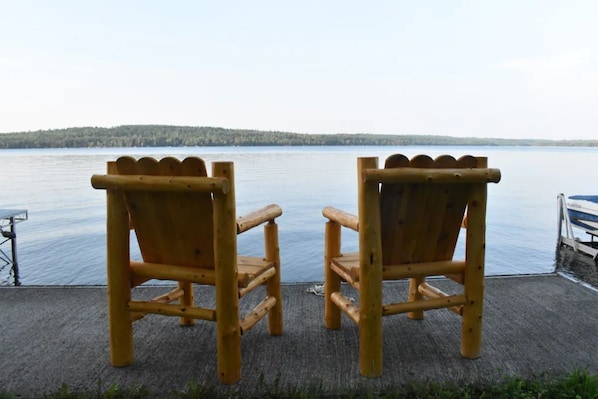 Chairs at water's edge