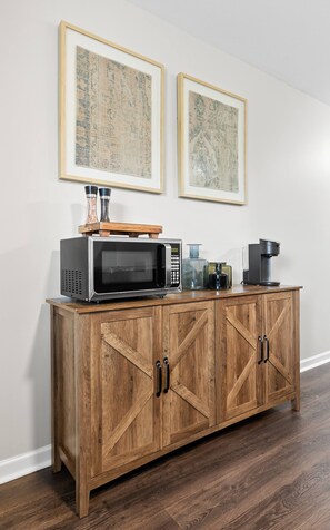 There is a microwave ready for heating up delicious meals and a coffee maker to help your prepare that perfect caffeine drink that will give you that needed energy early in the morning!