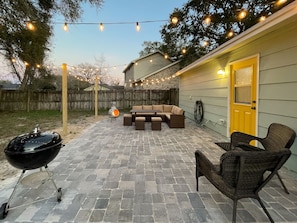 Cozy backyard hangout with grill and chimeneo