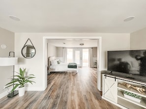 Sliding pocket doors allow for bedroom privacy; beautiful patio door to backyard