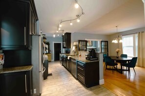 Open dining room and kitchen.