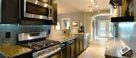 Kitchen with gas stove. 