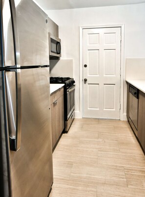 Sleek compact kitchen area.