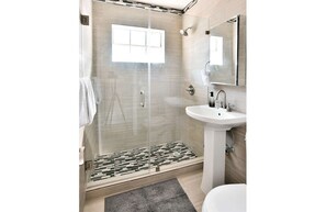 Sleek modern shower area.