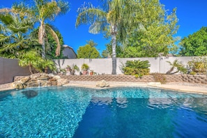 Mature landscaping enhances your pool experience.