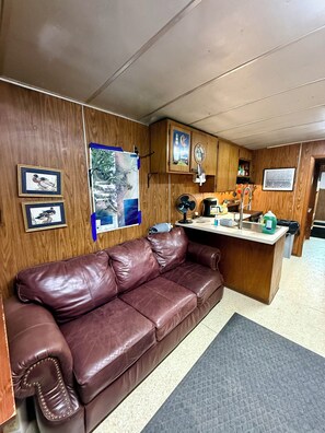 Full Sized couch with local nautical maps