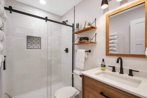 Remodeled bathroom with walk-in shower, Beautiful Tile, and extra amenities