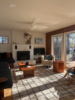 Light streaming in through the floor to ceiling window face