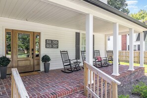 Come sit in a rocking chair overlooking Main Street!