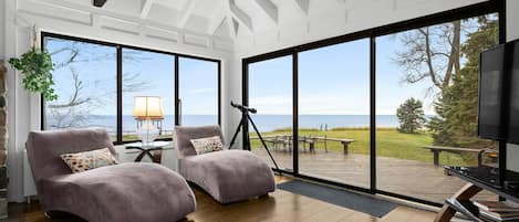 The sliding patio doors provide a stunning view on Lake Michigan.