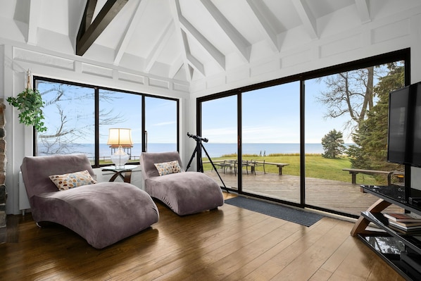 The sliding patio doors provide a stunning view on Lake Michigan.