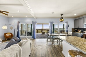 Get a view of the beach while hanging out inside.