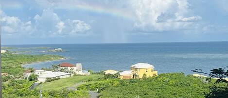 One of the many rainbows you will experience from the balcony of your Vacation Rental!