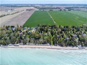 Aerial view of our cottage community road and beautiful beach