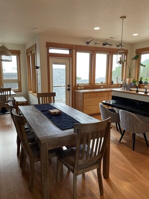 Dining room table - seats 8. We also have a second table that sits 5 + bar top. 