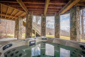 Enjoy the beautiful mountain views as you soak in the Hot Tub