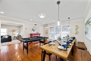 Enjoy a meal in this elegant dining with a fireplace and pool table!